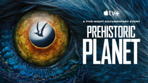 Stylised image featuring a dinosaur's eye with a pterosaur reflection, and the words 'A Five Night Documentary Event: Prehistoric Planet' with the Apple TV+ logo